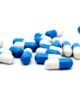 blue and white Vyvanse capsules